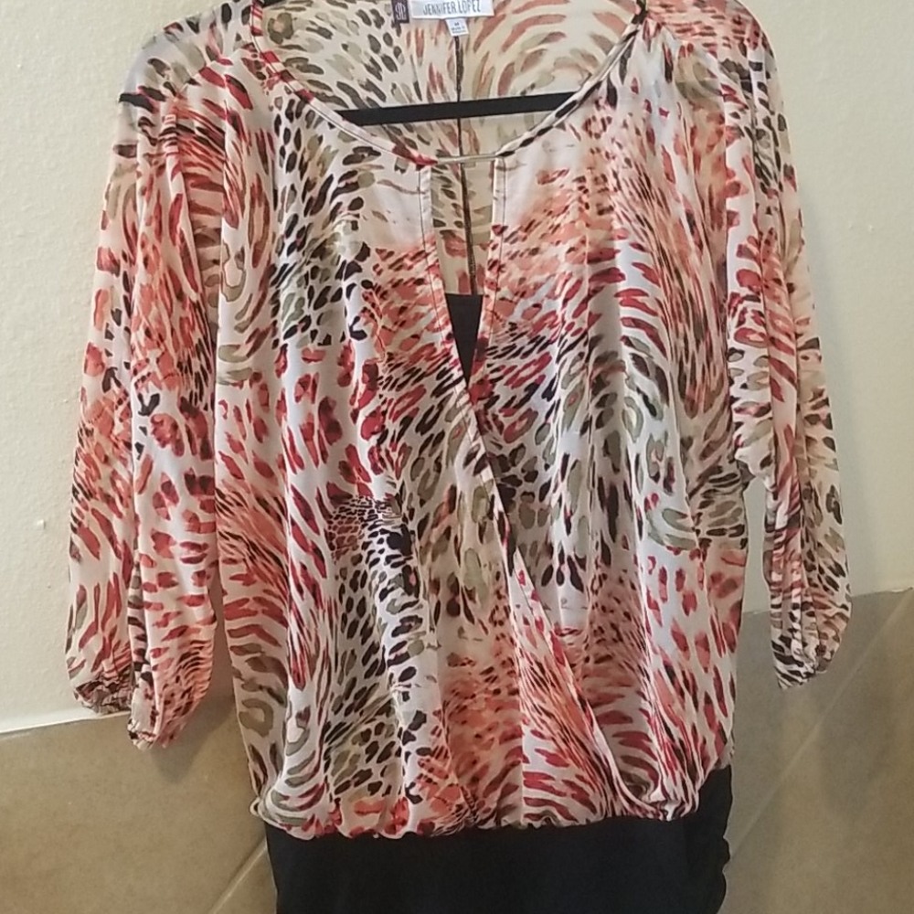Jennifer Lopez animal print blouse